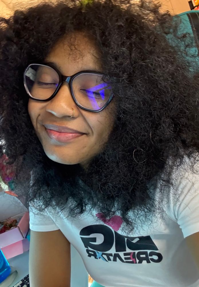A selfie of me wearing glasses with my eyes closed 