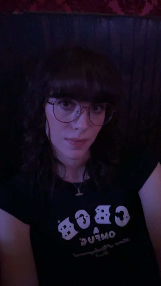 Selfie of me in dark lighting in a bar