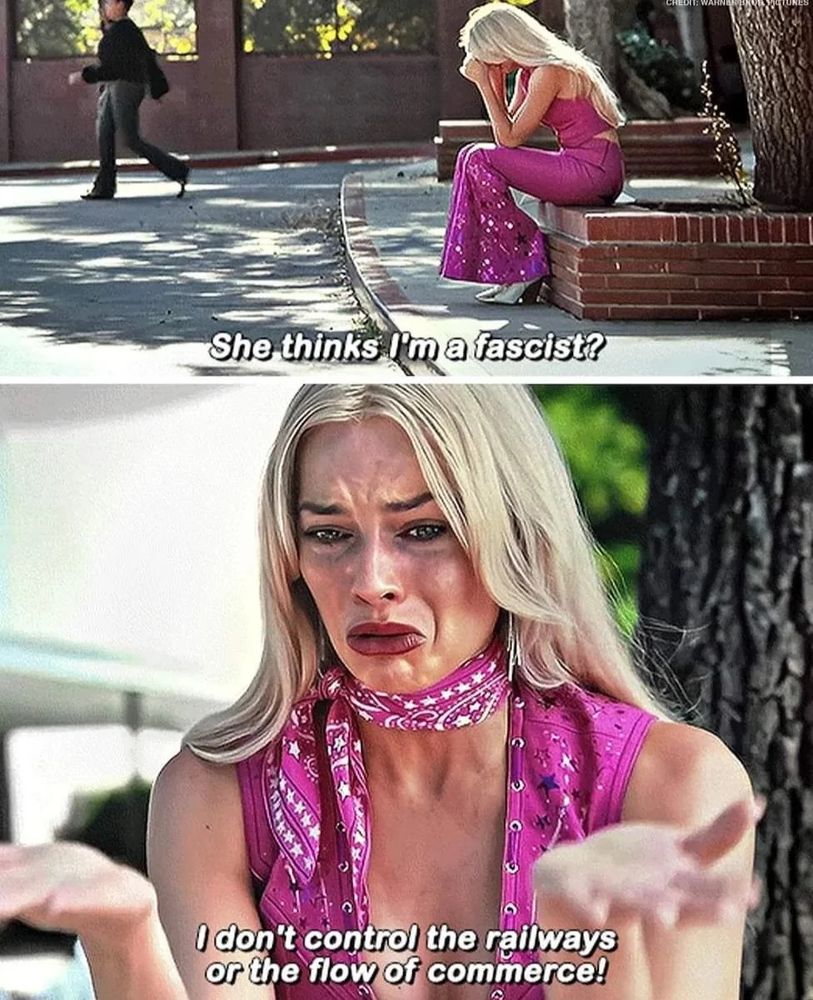 Margot Robbie as Barbie sits in a hot pink disco cowgirl outfit outside a middle school. Tears stream down her face as she recalls that the mean bratz girls called her a fascist. She muses “I’m not a fascist, I don’t control the railways or the flow of commerce”