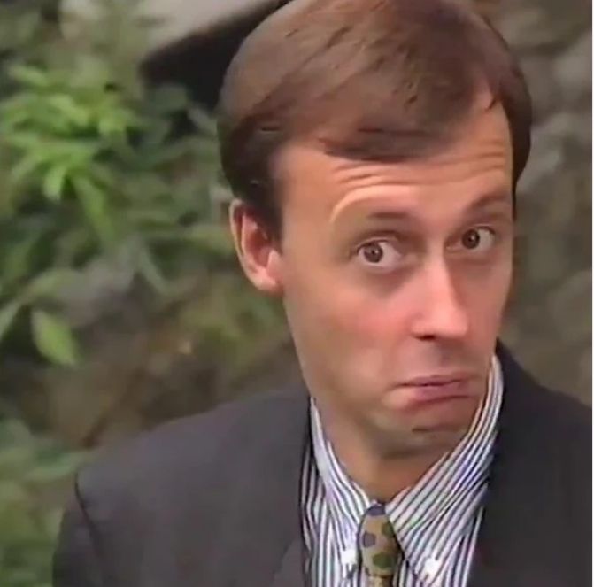 Bild von Friedrich Merz aus einem alten Wahlwerbespot, auf dem er erstaunt guckt