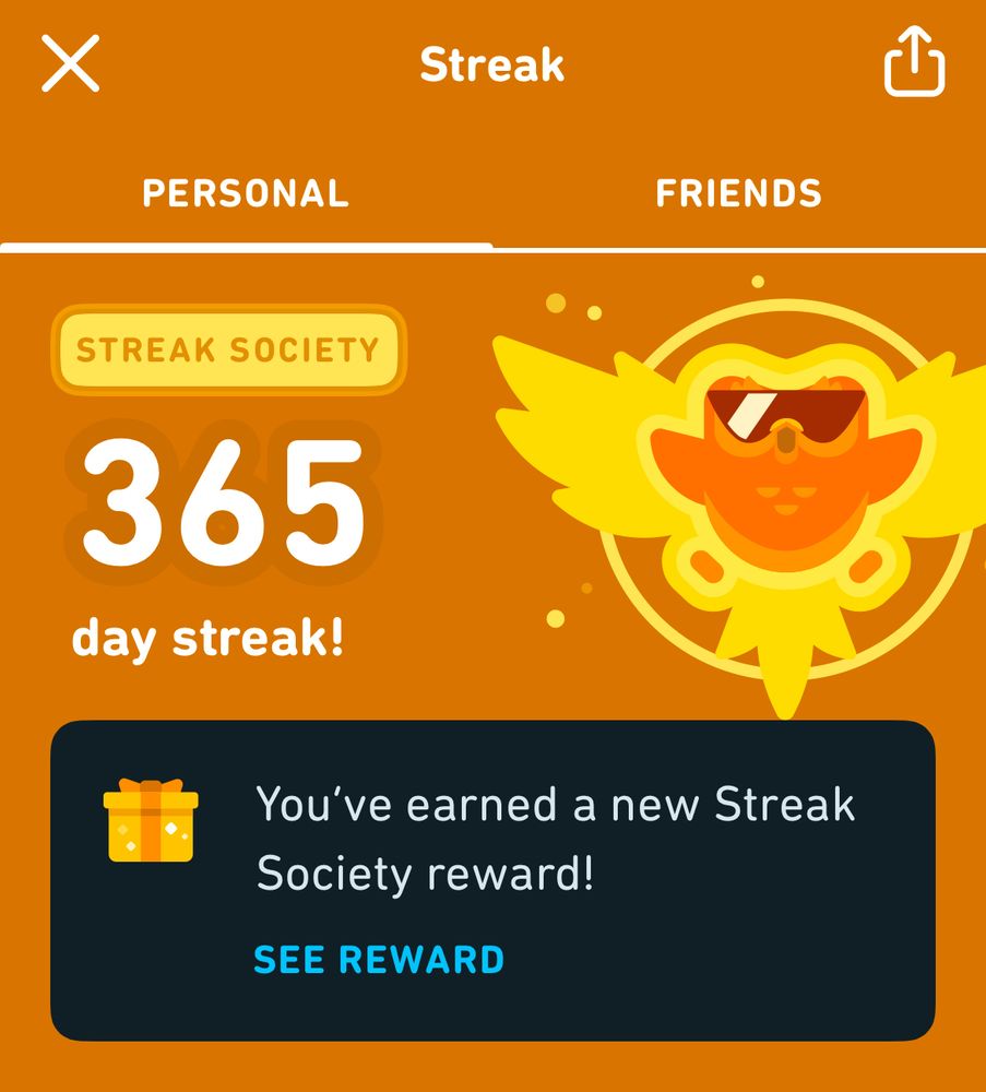 A partial phone screenshot.
It shows a celebratory congratulations from the Duolingo language learning app, for completing a 365 days long streak. 