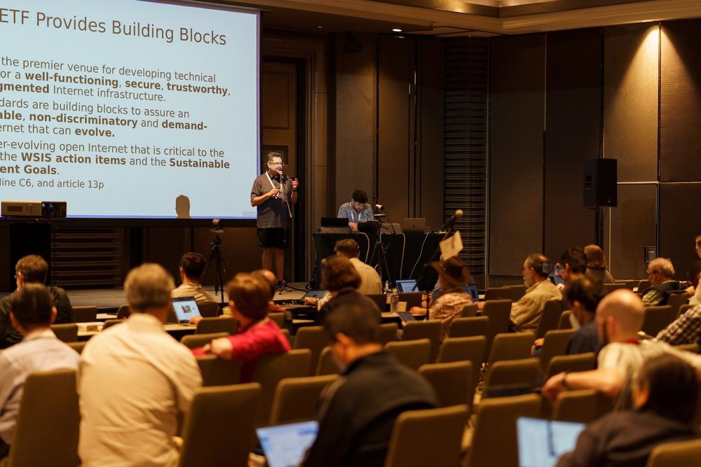 photo of a speaker at the IABOPEN session during the IETF 122 Bangkok meeting