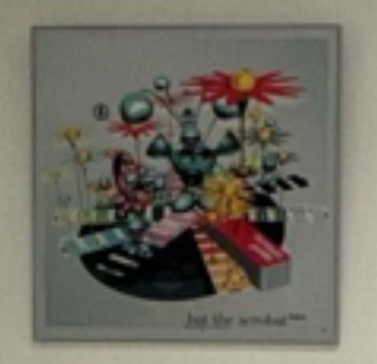 Un tableau avec des fleurs très moche on dirait un truc fait par une IA