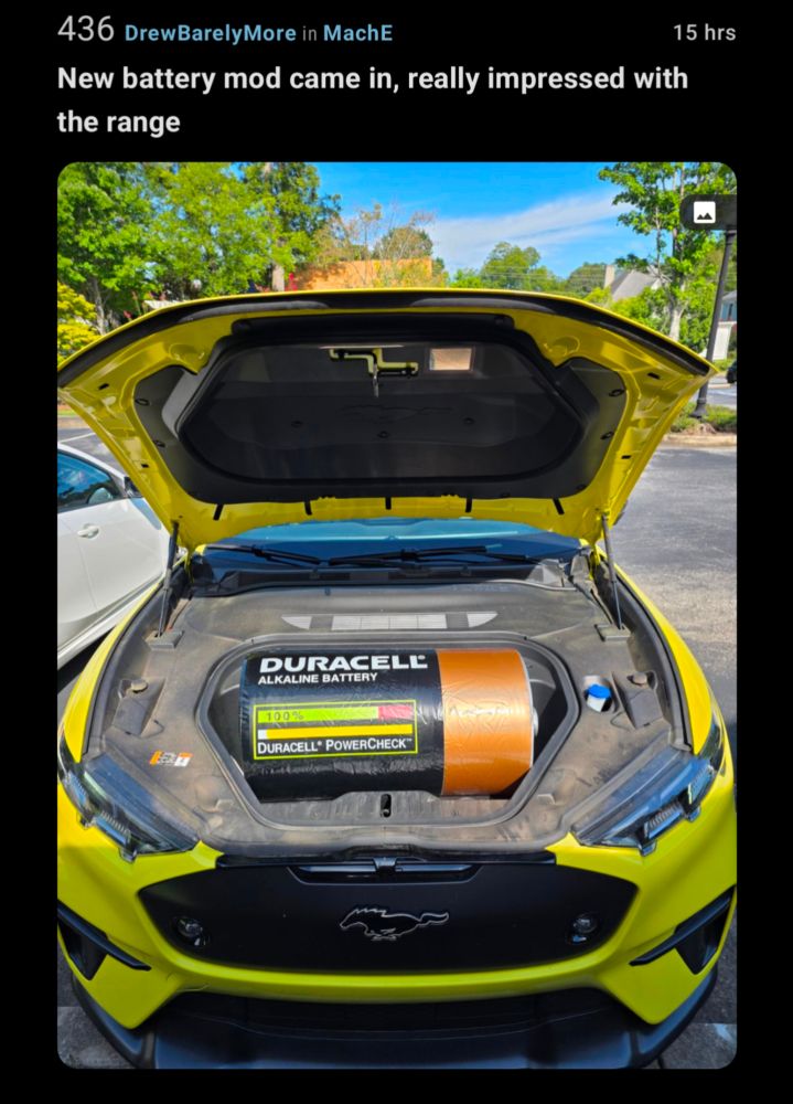 screenshot of a post on the MachE subreddit where someone put a giant Duracell model thing in their mach e frunk, post titled 
