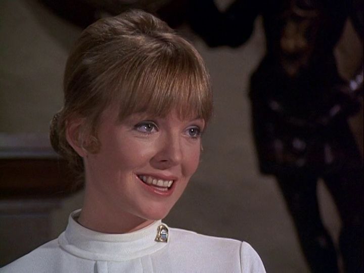 Diane Keaton as nurse, smiling