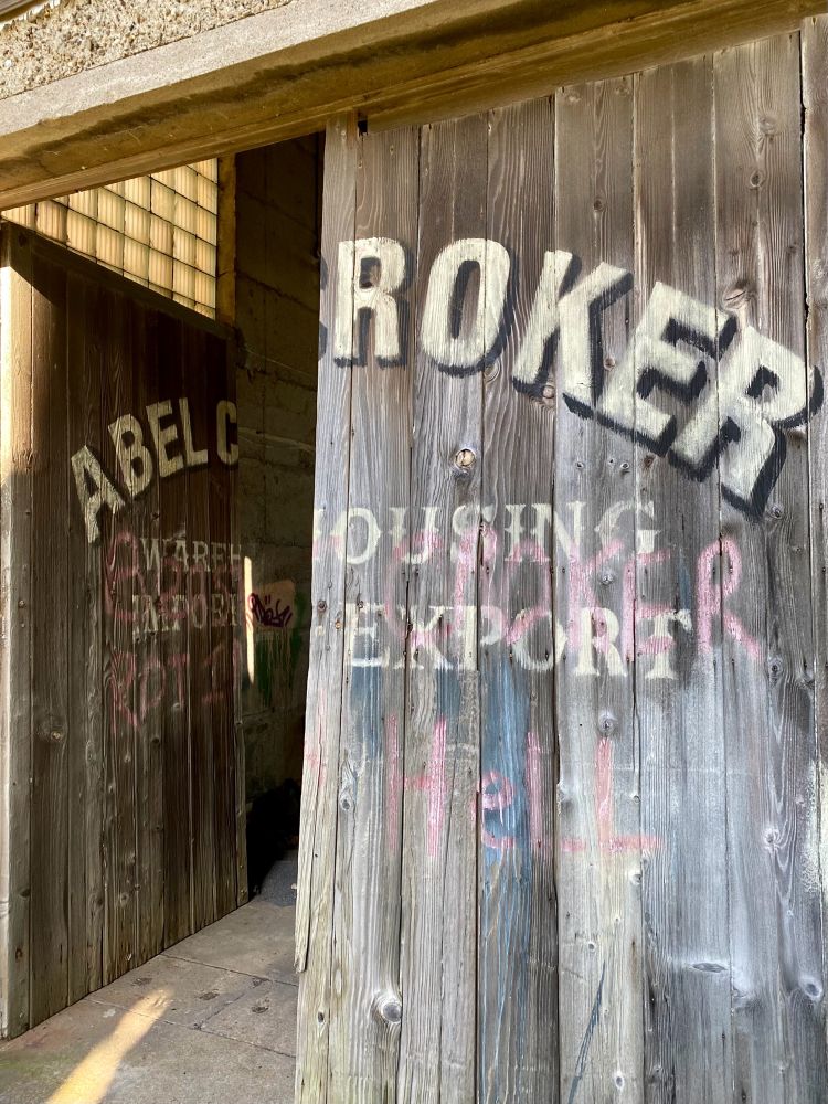 Old signage on a wooden door - Abel Croker, Warehousing, Import, Export