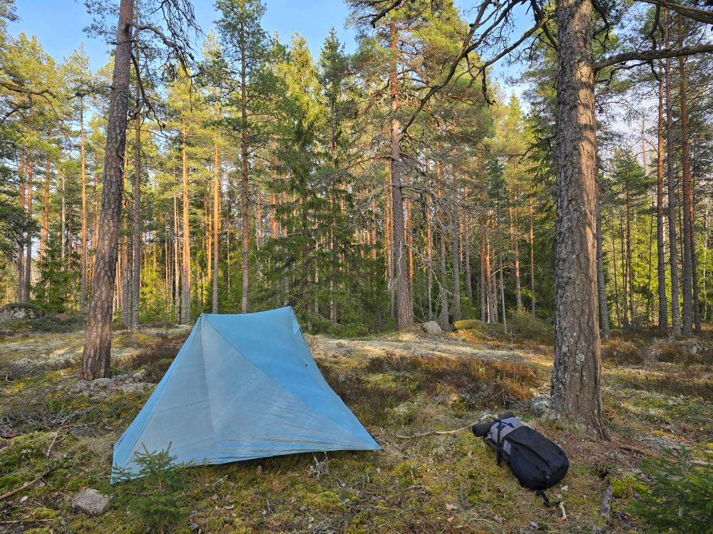 Tent and pack close to Vaskijärvi strict nature reserve in Finland.