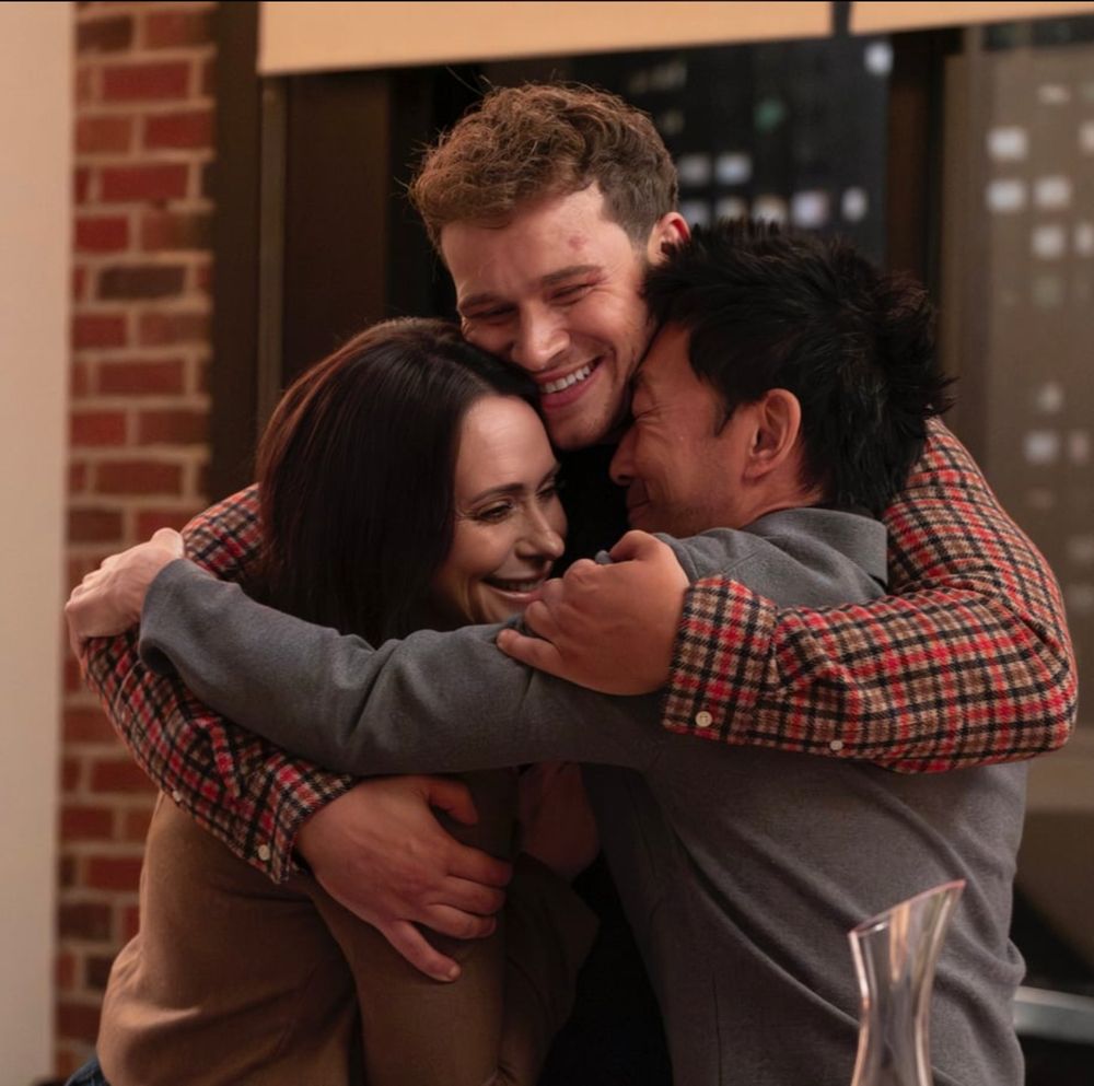 Maddie, Buck, and Chimney from 9-1-1 hugging