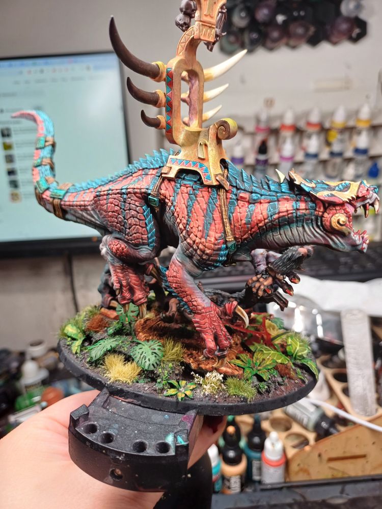 A red carnosaur with jungle base and black stripes