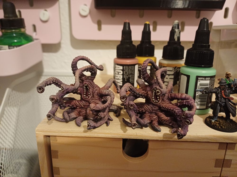 2 lovecraftian tentacle beasts