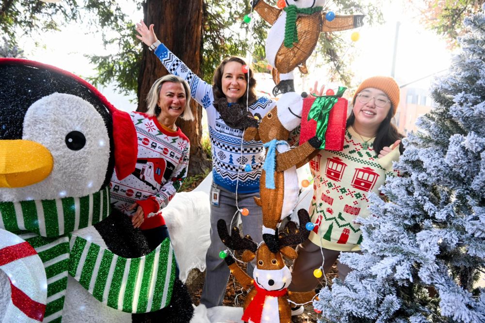 The Caltrain, Muni, and BART sweater being celebrated at SweaterFest. 