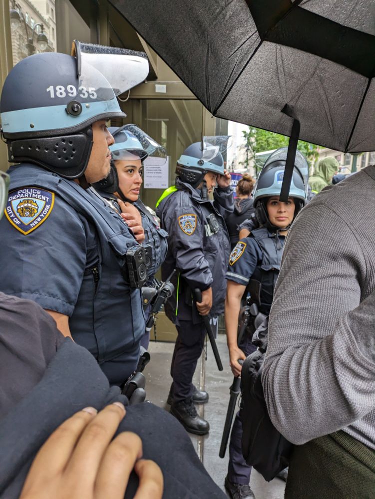 A bunch of NYPD officers in riot gear