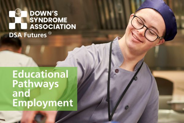 A man with Down's syndrome is pictured smiling whilst working in a kitchen. 