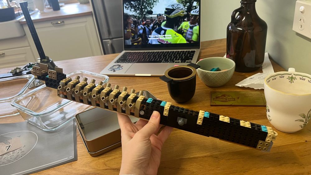 A thick lego structure that is starting to be slightly bone coloured and bone shaped