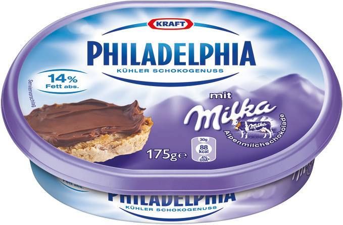 A pack of Kraft-brand Philadelphia soft cheese with Milka chocolate branding. It shows a picture of a a chocolate-coloured spread on bread.