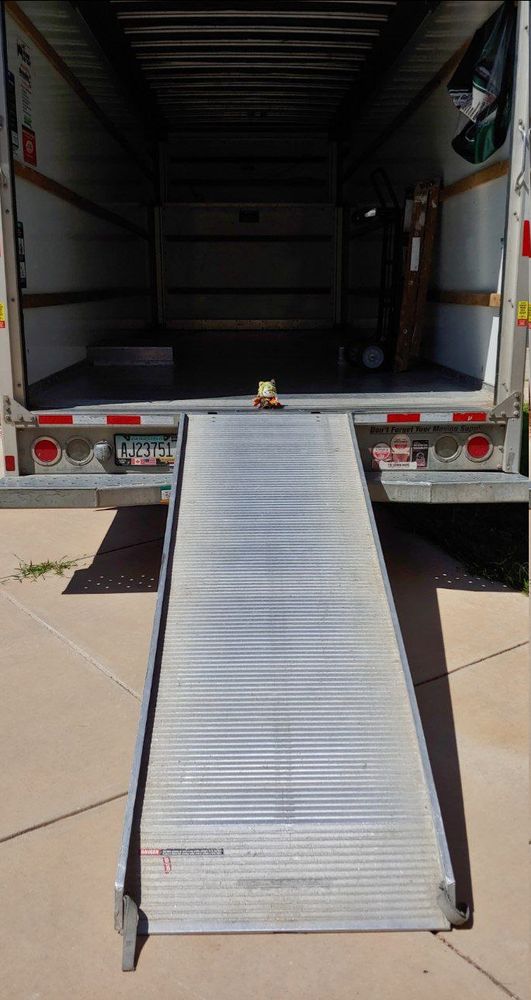 Girl_DM_ nui with ramp leading to empty truck.