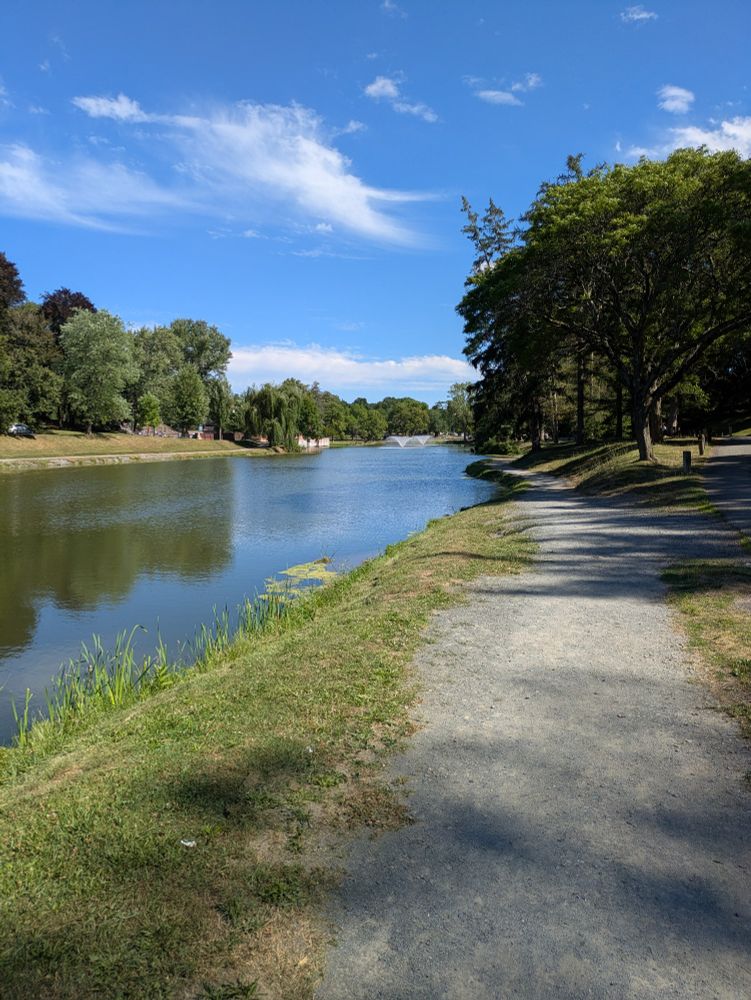 A trail on the south side of Washing Park Lake.