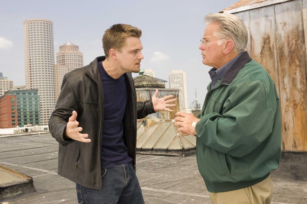 Rooftop scene from the Departed of an undercover cop and his CO in urgent conversation