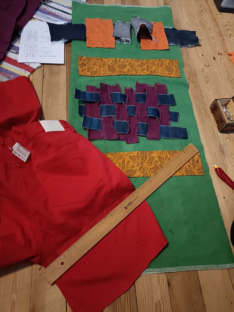 Work in progress on a dog snuffle mat, where an old pair of jeans are being used.
