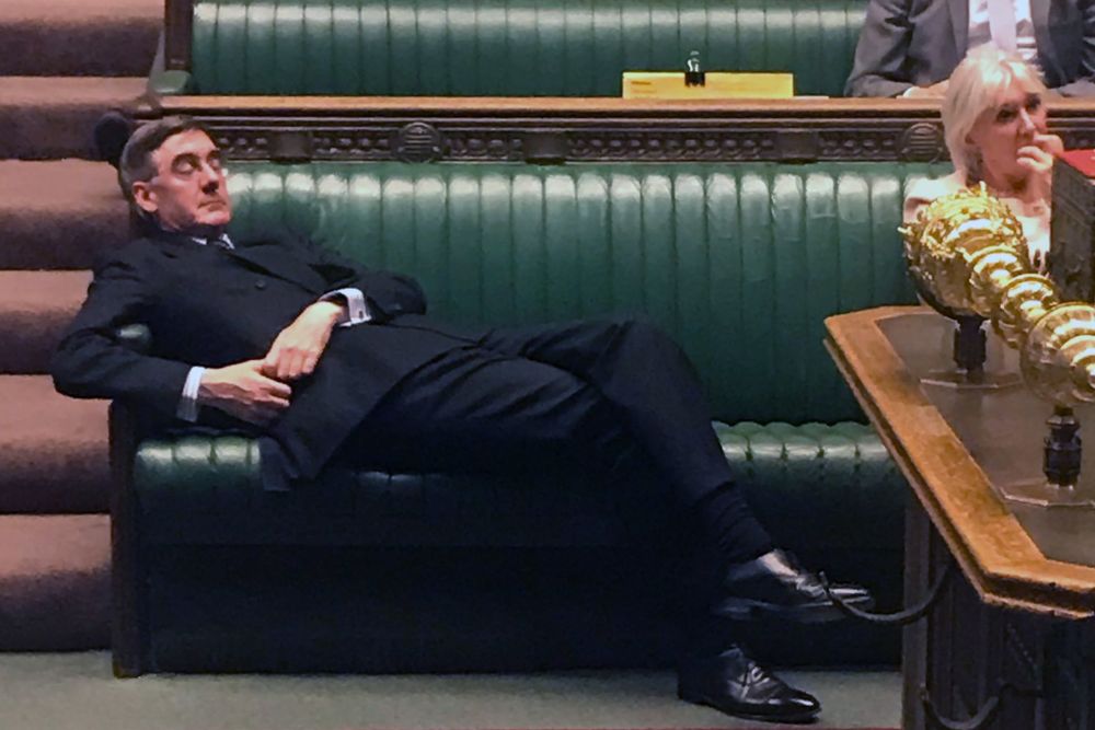 Jacob Rees-Mogg falling asleep & lying on the front row of the House of Commons government benches, during yet another late-night vote on his beloved 'Brexit'.