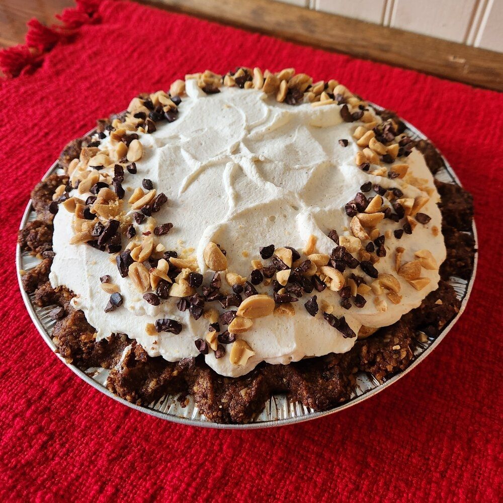 peanut butter pie with chocolate & peanuts on top