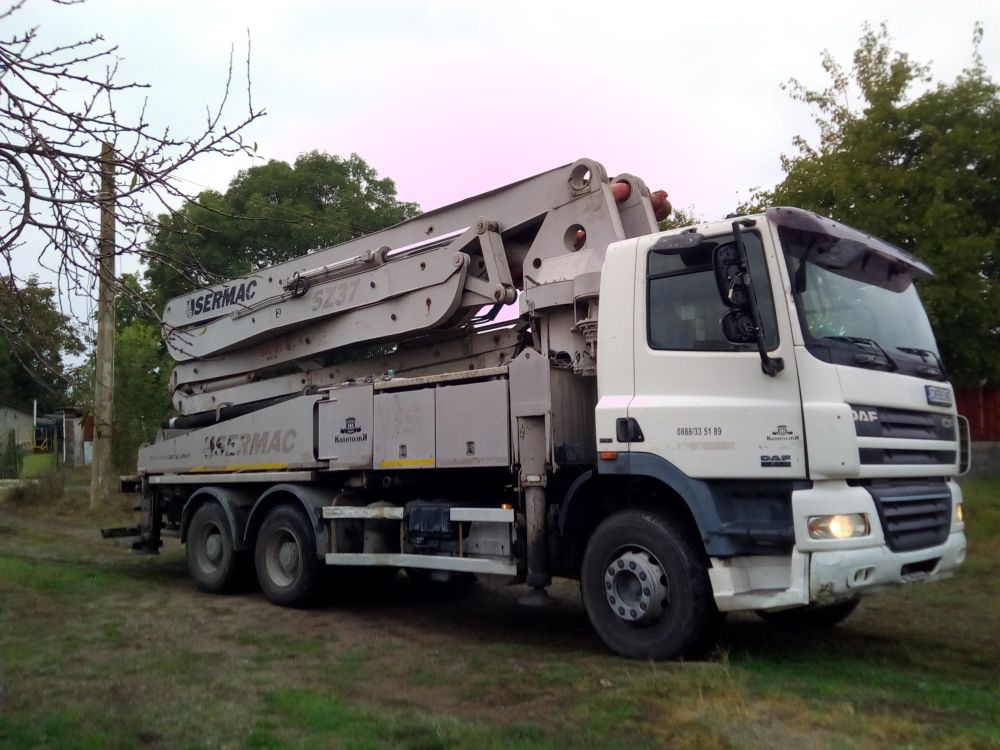 Big machinery is used to do this job, this is a truck with a built in pump, which can pump large quantities of concrete high up. A powerful piece of kit that almost broke our former, mainly because the guy operating it was an idiot, but that's another story. 