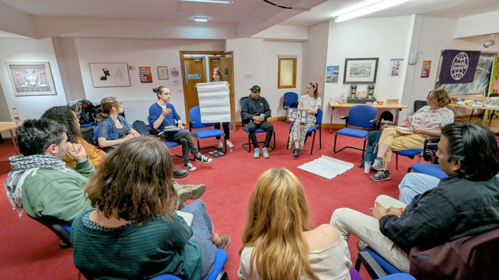 Circle of students seated talking