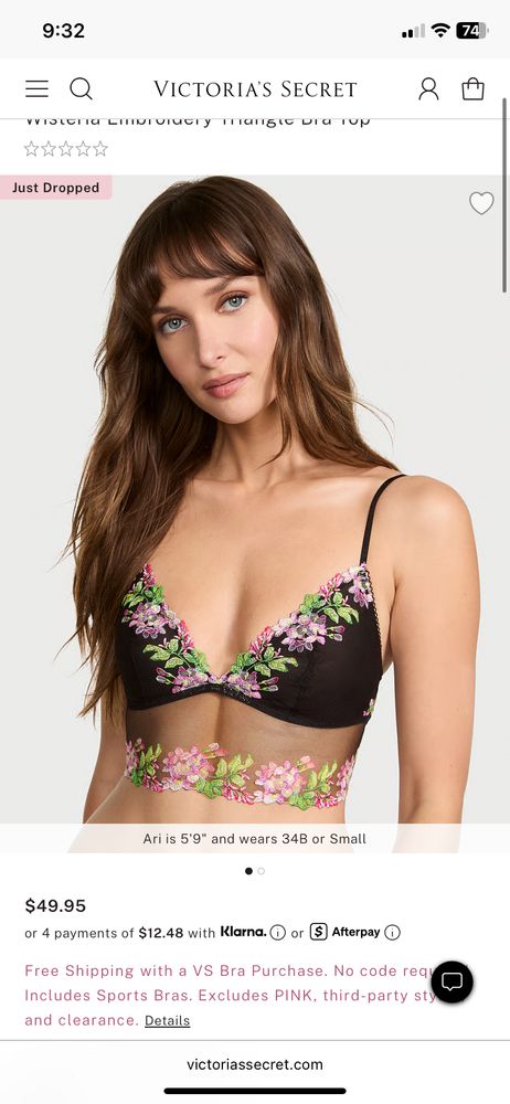 Screenshot of a Victoria’s Secret lingerie top that is black with pink and green floral embellishments 