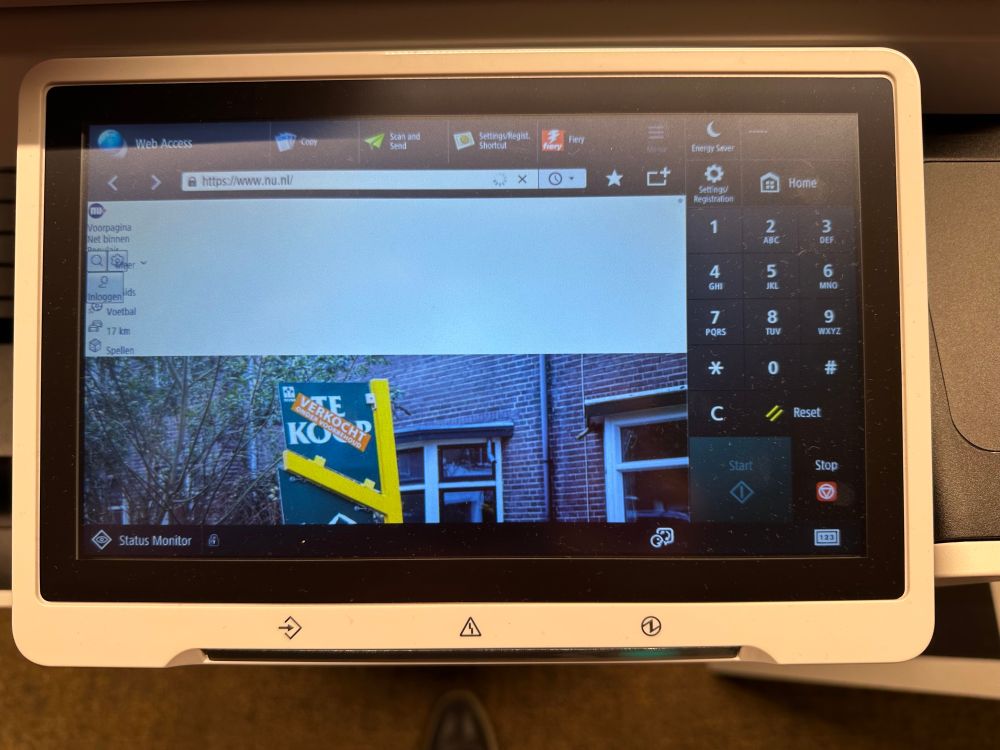 Canon printer display shows a browser with address bar