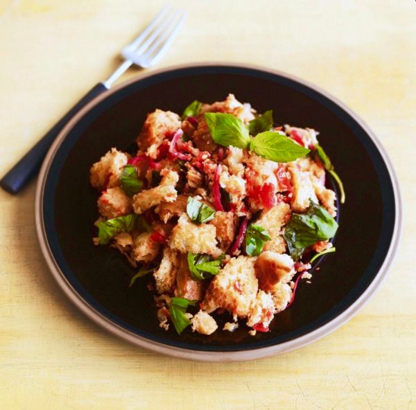 Panzanella, which sounds as though it should be the name of the beautiful heroine in a ballet or a fairy tale, is the word for a damp and tomatoey bread salad from Italy. Not only is it a good way of ...