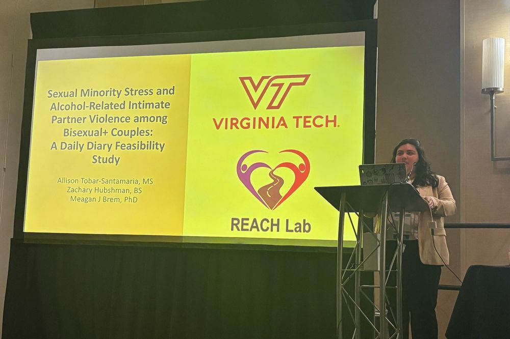 Presentation title slide that reads, “Sexual minority stress and alcohol-related intimate partner violence among bisexual+ couples: A daily diary feasibility study.”