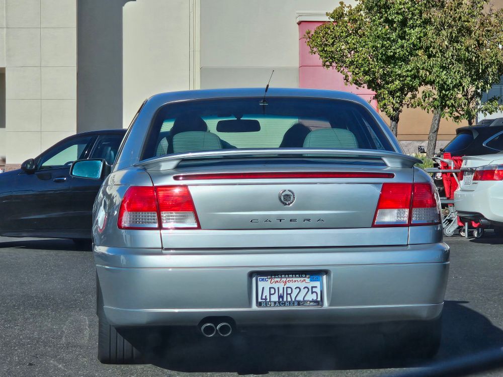 a Cadillac Catera in a target parking lot