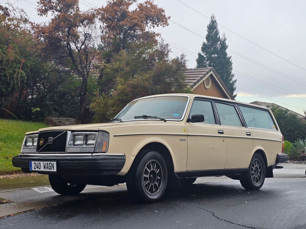 front 3/4 shot of a cream 1983 Volvo 245