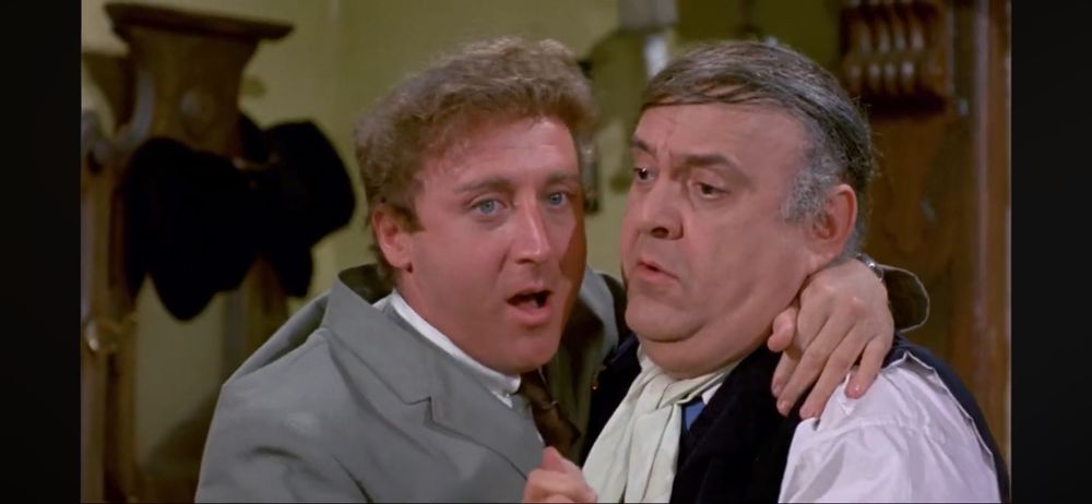 Max Bialystock (Zero Mostel) tangos with Leo Bloom (Gene Wilder) in the 1968 movie, “The Producers”.