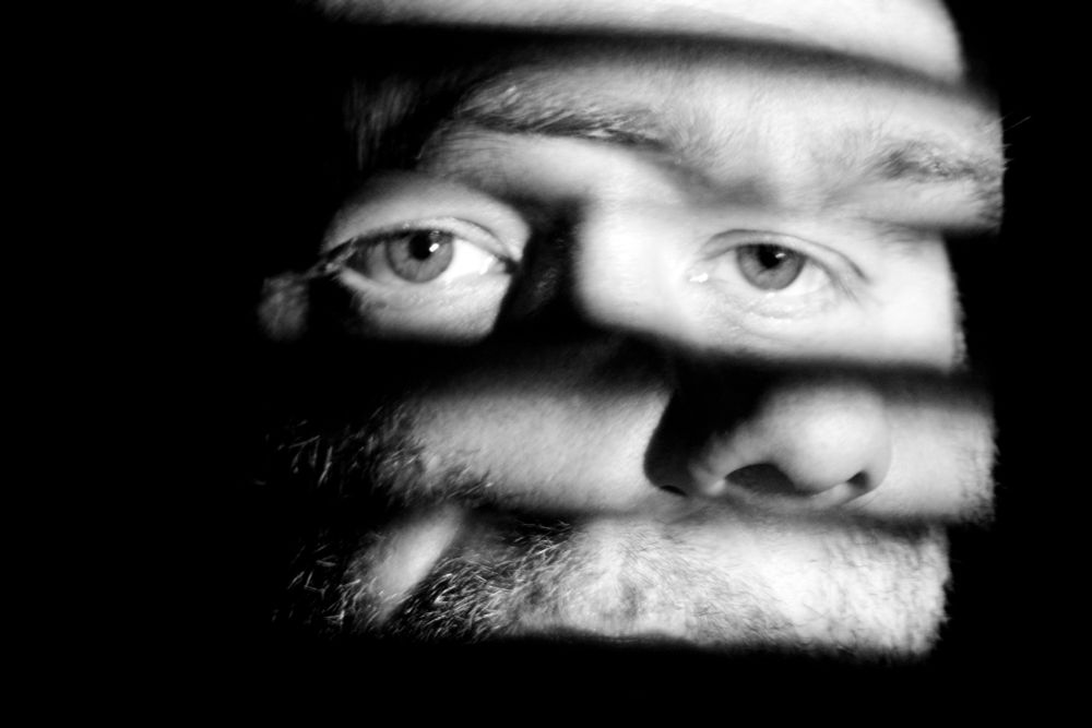Similar image, except here, both exposure are staring more or less at the camera, but shifted left or right by an inch or so. My nose, therefore, pokes out from under my left eye, and my eyebrows are centered over that eye.