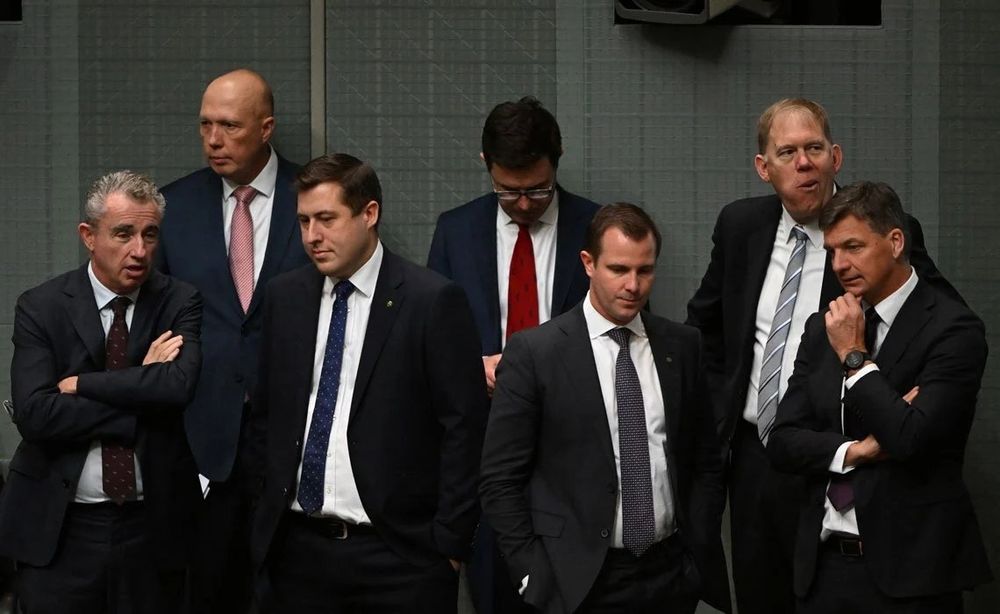 Glum looking LNP dudes who have NFI about anything 