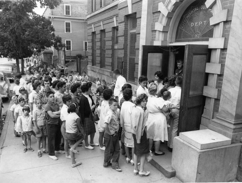 People lining up to be immunized against polio. (Worcester Telegram)