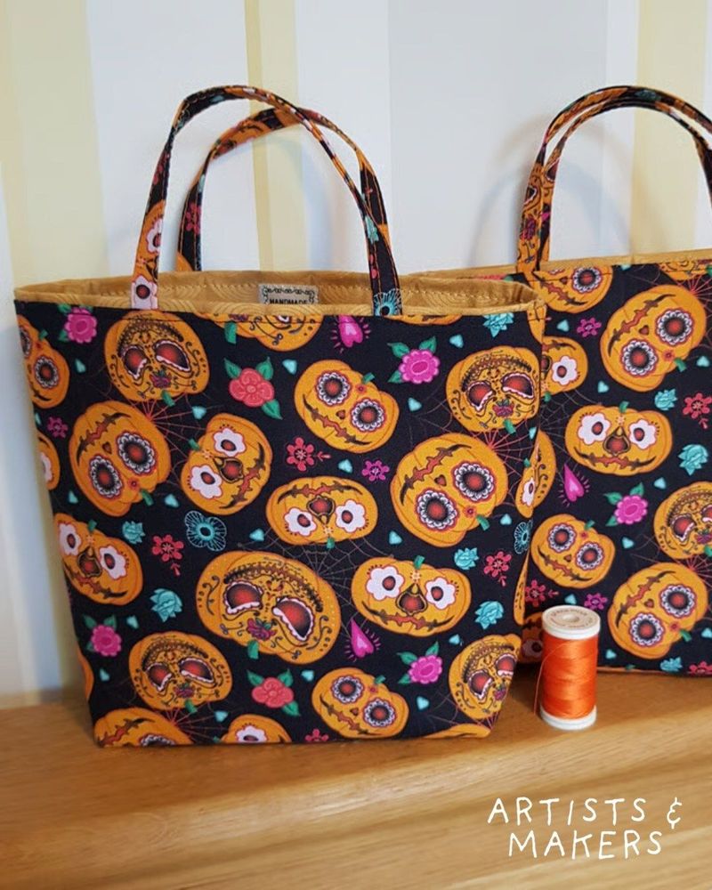 Hand-made bags with a Halloween Jack O'Lantern pattern