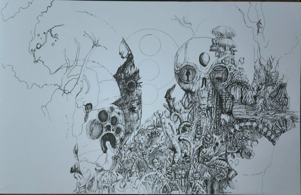 A work in progress pen drawing of a giant skull built into a hillside of alien shapes