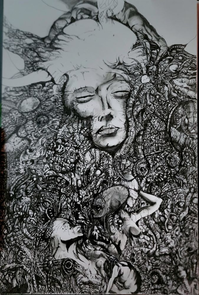 A work in progress pen drawing of a partial human face that flows organically into smaller figures amd faces