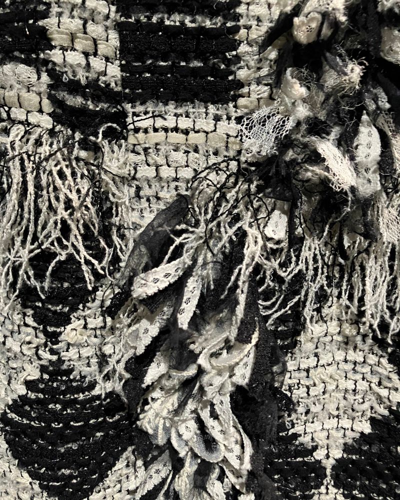 黒と白のツイードのアップ写真