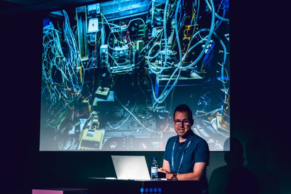 A presentation about legacy code, showing a picture with a mess of cables to represent a legacy codebase.