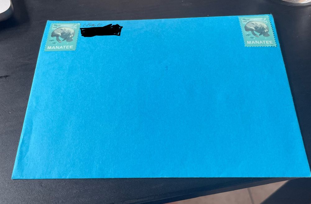 envelope with stamp on the wrong side