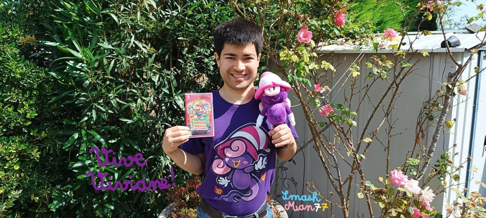 It's me holding my TTYD remake game box & my Vivian Plush, while I was wearing this fitting Vivian T-Shirt.💜🔥🏳️‍⚧️
The French sentence "Vive Viviane !" means "Long live Vivian !".
Jeu de mots intentionnel. Pun intended.