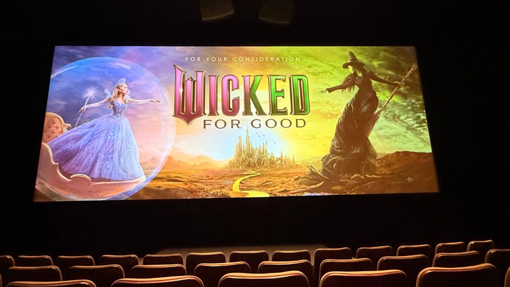 Theater screening with a still image of Wicked For Good