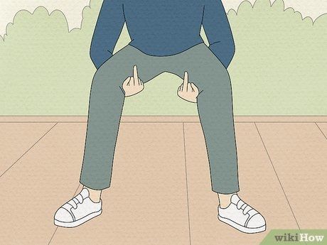 Wikihow picture showing a man performing and under or through the leg flipping off 