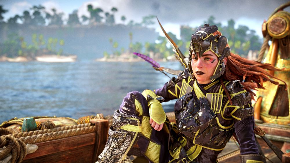 Aloy sitting on a boat, staring off into the distance.