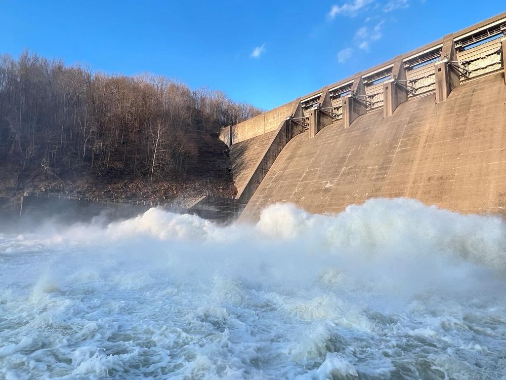 Heavy water flowing, resembling ocean waves, at Sutton Dam, West Virginia. 