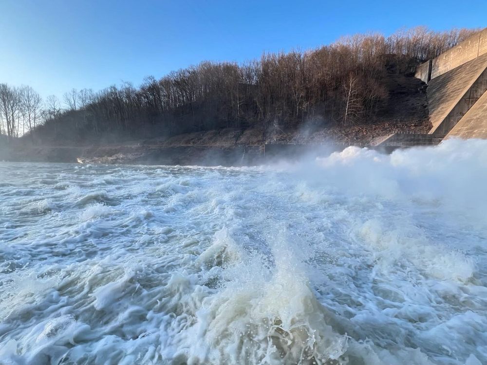 Heavy water flowing, resembling ocean waves, at Sutton Dam, West Virginia. 