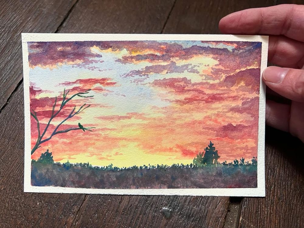 Watercolor painting study of a sunrise and trees, by artist Tara Fly. 4" by 6". 